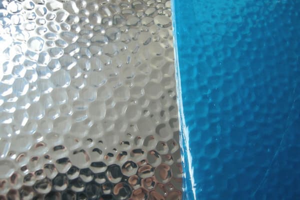 Stucco embossed aluminum sheet with bule film